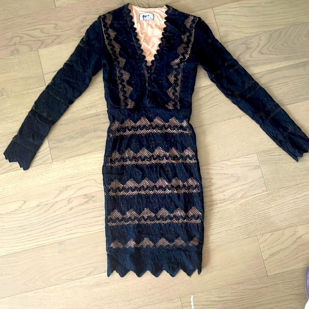 Black with nude lining Nighcap fitted dress.